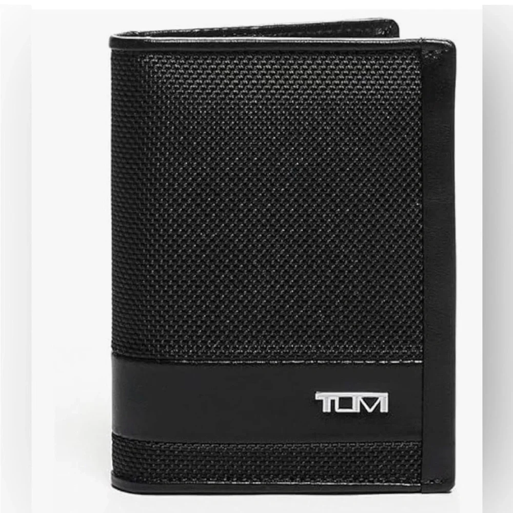 Tumi Black Textured Wallet new without tags in excellent condition